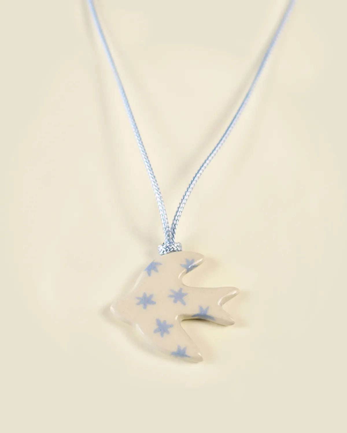 BEIGE & BLUE SWALLOW PENDANT